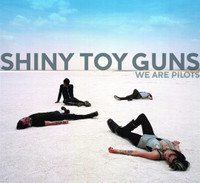 Starts With One_Shiny Toy Guns